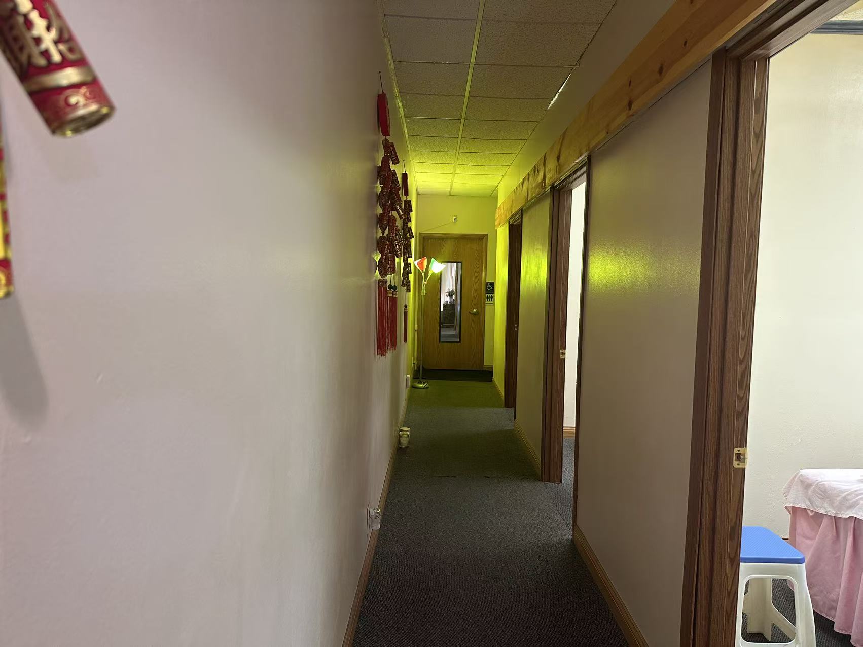 Hallway leading to treatment rooms at 7 DAY SPA